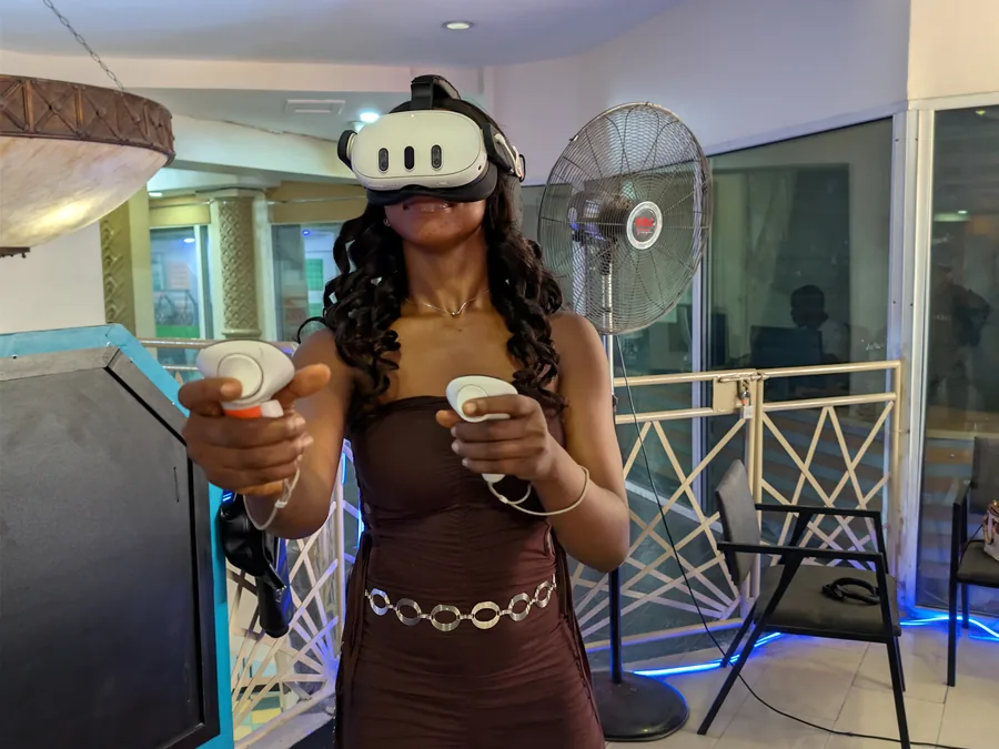 Player One Arena VR guest using headset and controllers