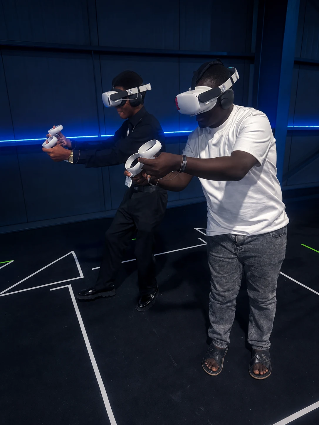 Two Player One VR players, with an art-directed background